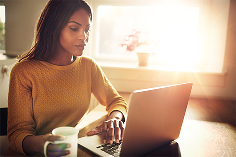 Image of a woman taking an online assessment