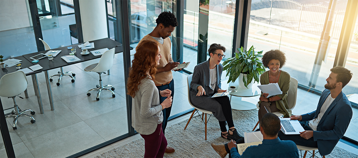 Image of a small group of employee in a meeting