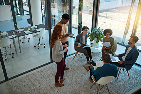 Image of a small group of employee in a meeting