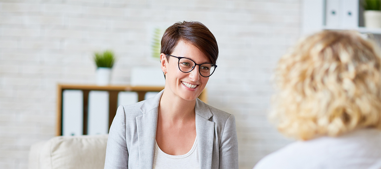 Image of a woman receiving a workplace consultation session